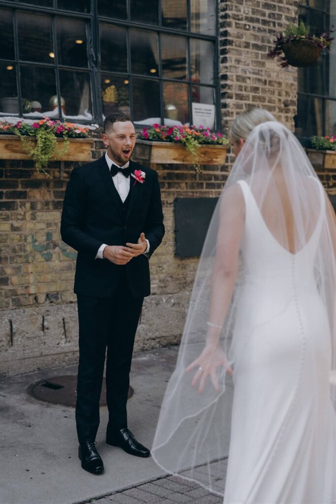 Groom's jaw drops as he sees his bride for the first time