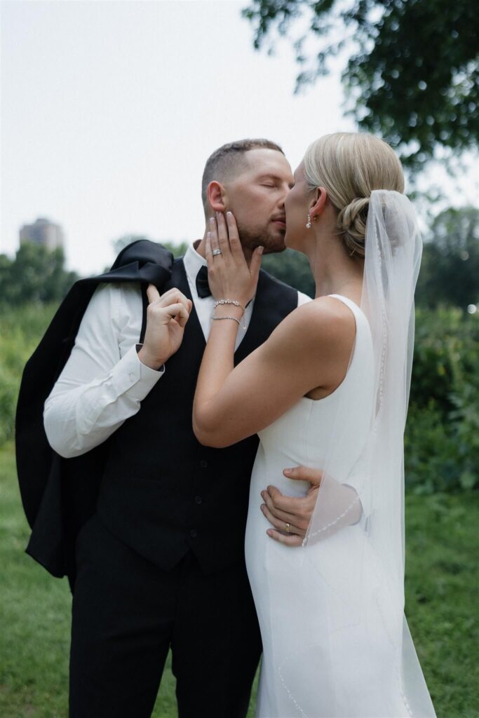 Bride and groom kiss at microwedding in downtown Minneapolis