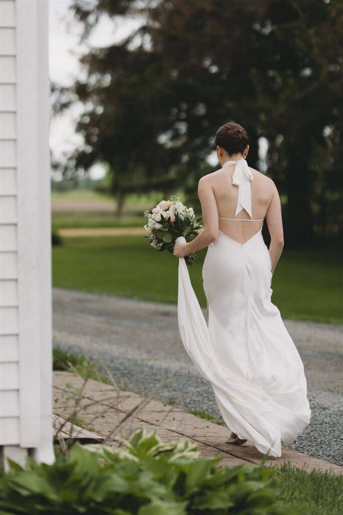 Bride walks alone towards her husband