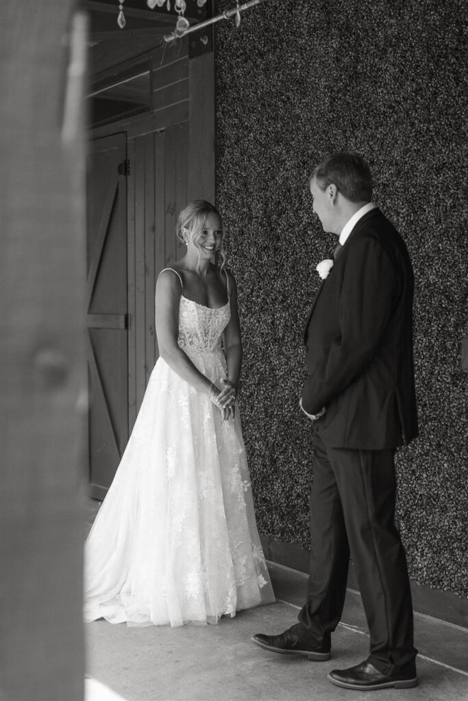 Father of the bride sees her in her wedding gown for the first time