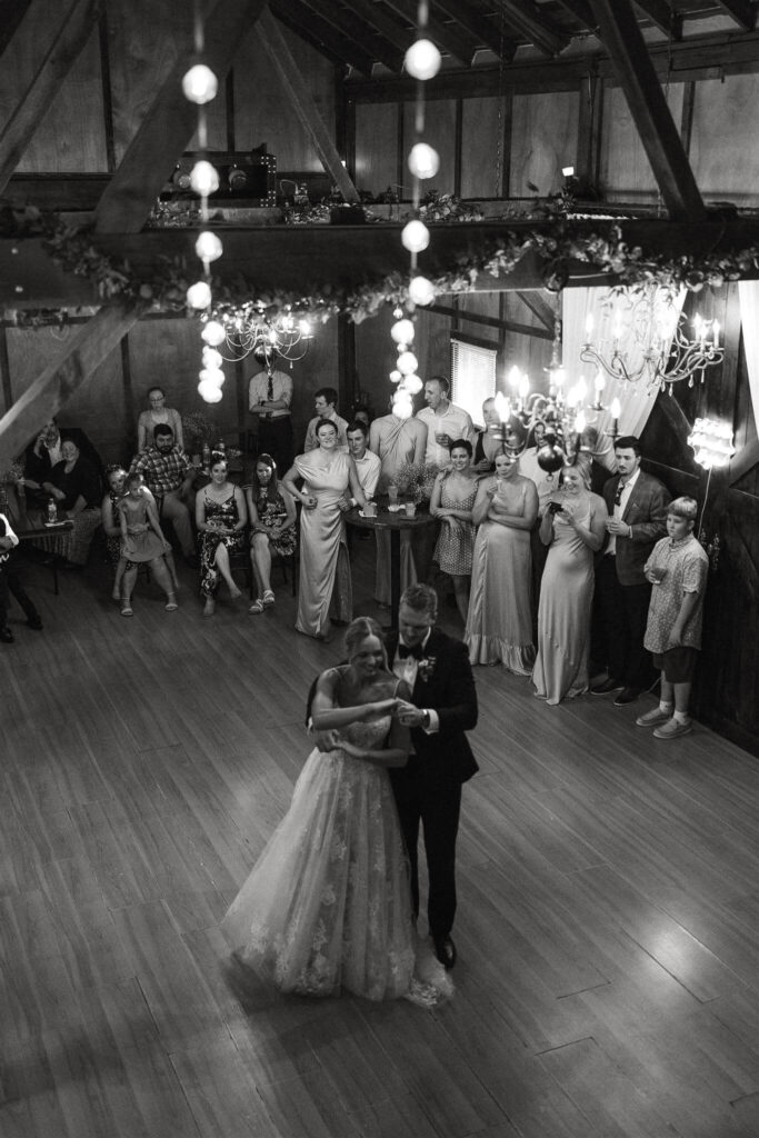 Bride and groom dance below at Hope Glen farm wedding venue