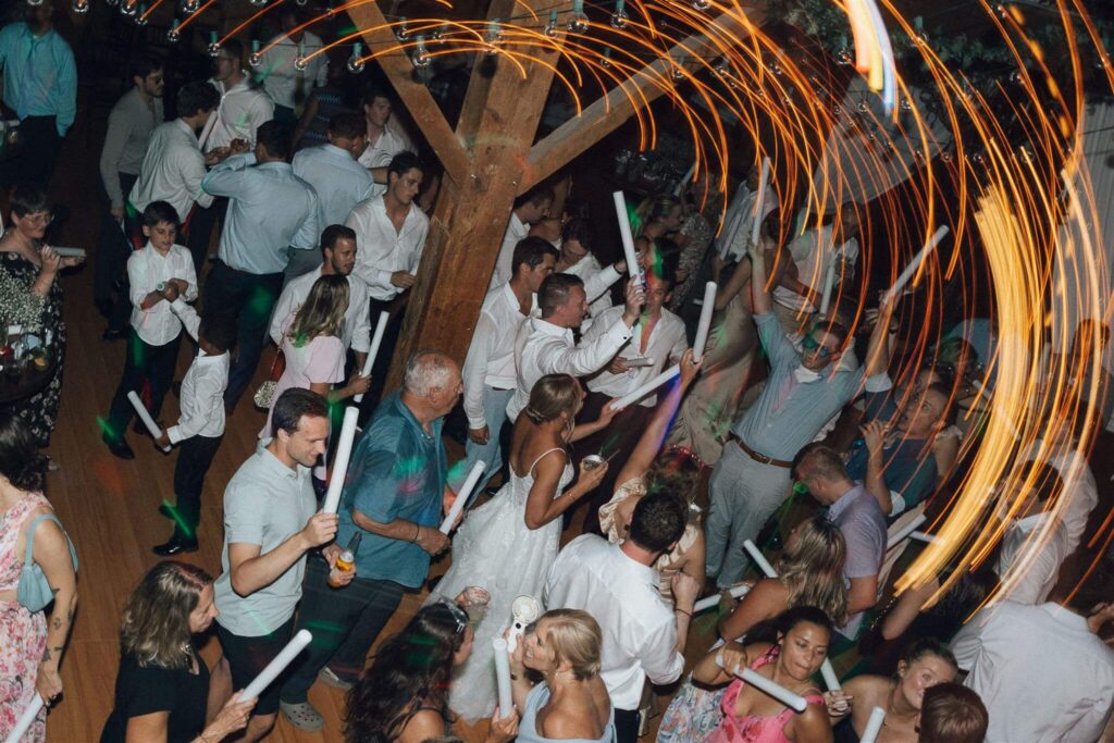 Newlyweds and guests dance at Hope Glen Farm wedding venue in Minnesota