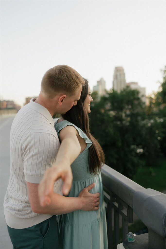 Engaged couple imitates Titanic pose in engagement photography ideas in Minneapolis