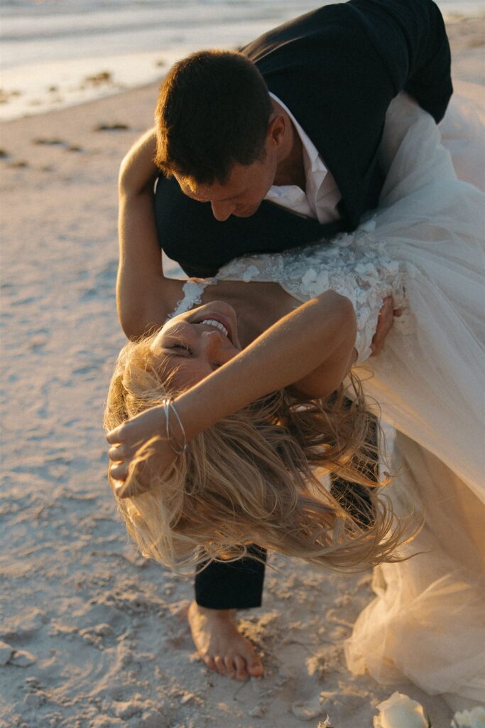 Beach destination elopement first dance dip