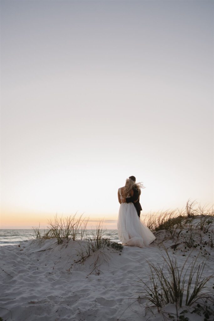 Beach destination elopement by cinematic wedding photographer