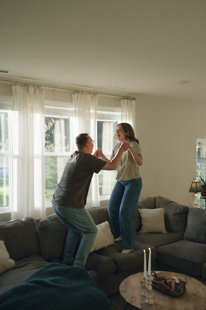 Minnesota couple jumps playfully on their couch