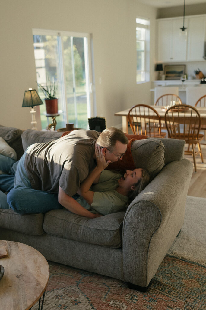 Married couple engages in playful Minnesota couples photography session