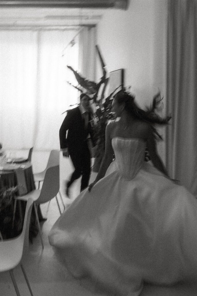 Groom chases bride around Paris Dining Club in Minneapolis