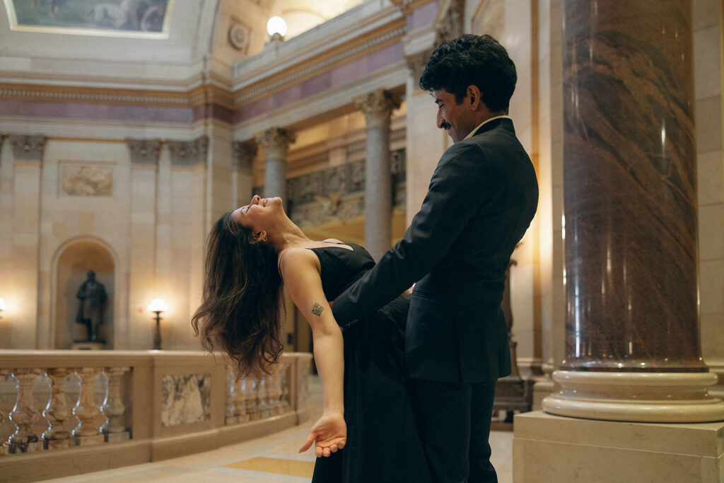 Shubhi throws her head back in reckless abandon as Abhi holds her tightly