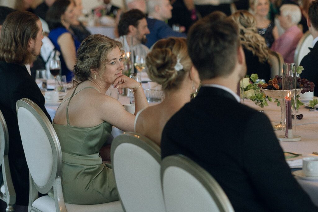 Guests enjoying speeches and dinner during Edward Anne Estate wedding reception.