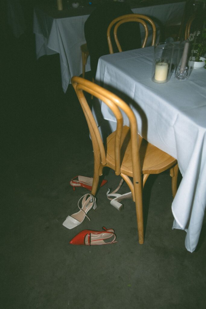 Wedding shoes kicked off under a table at Catalyst at Nature Link after the reception.